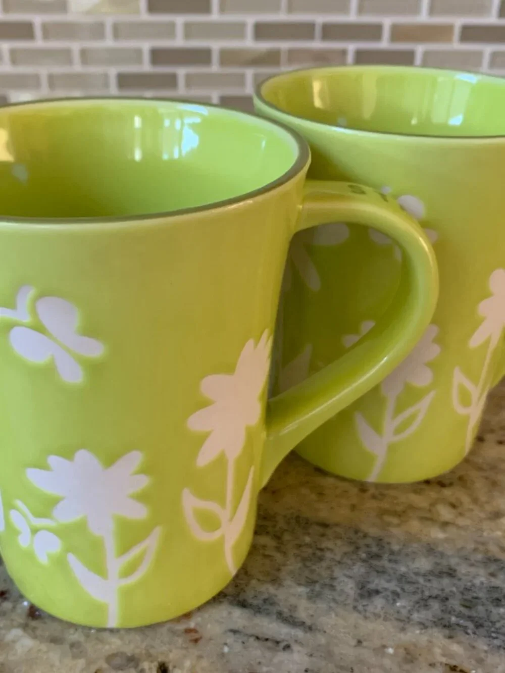Starbucks 2007 lime green ceramic coffee mug white etched flowers lot of 2 12 oz
